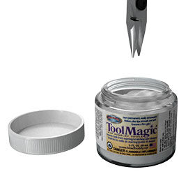 Pliers over a jar of tool magic
